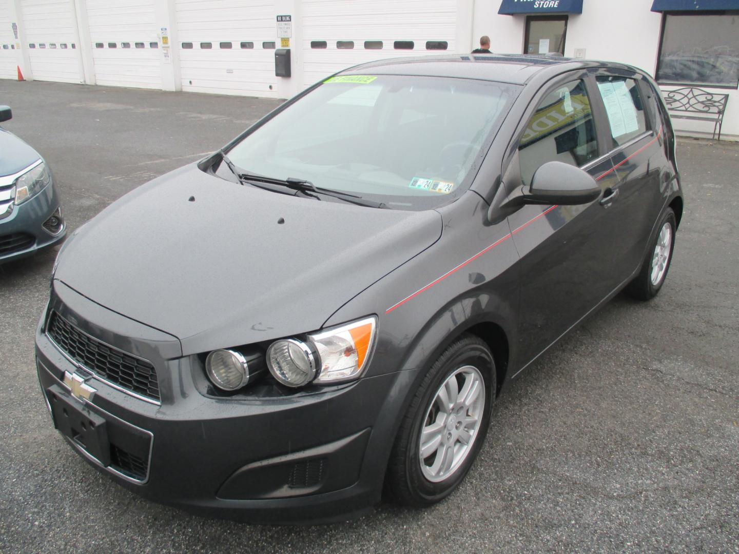 2016 GRAY Chevrolet Sonic LT Auto 5-Door (1G1JC6SG9G4) with an 1.8L L4 DOHC 24V engine, 6A transmission, located at 1254 Manheim Pike, Lancaster, PA, 17601, (717) 393-9133, 40.062870, -76.323273 - Photo#0